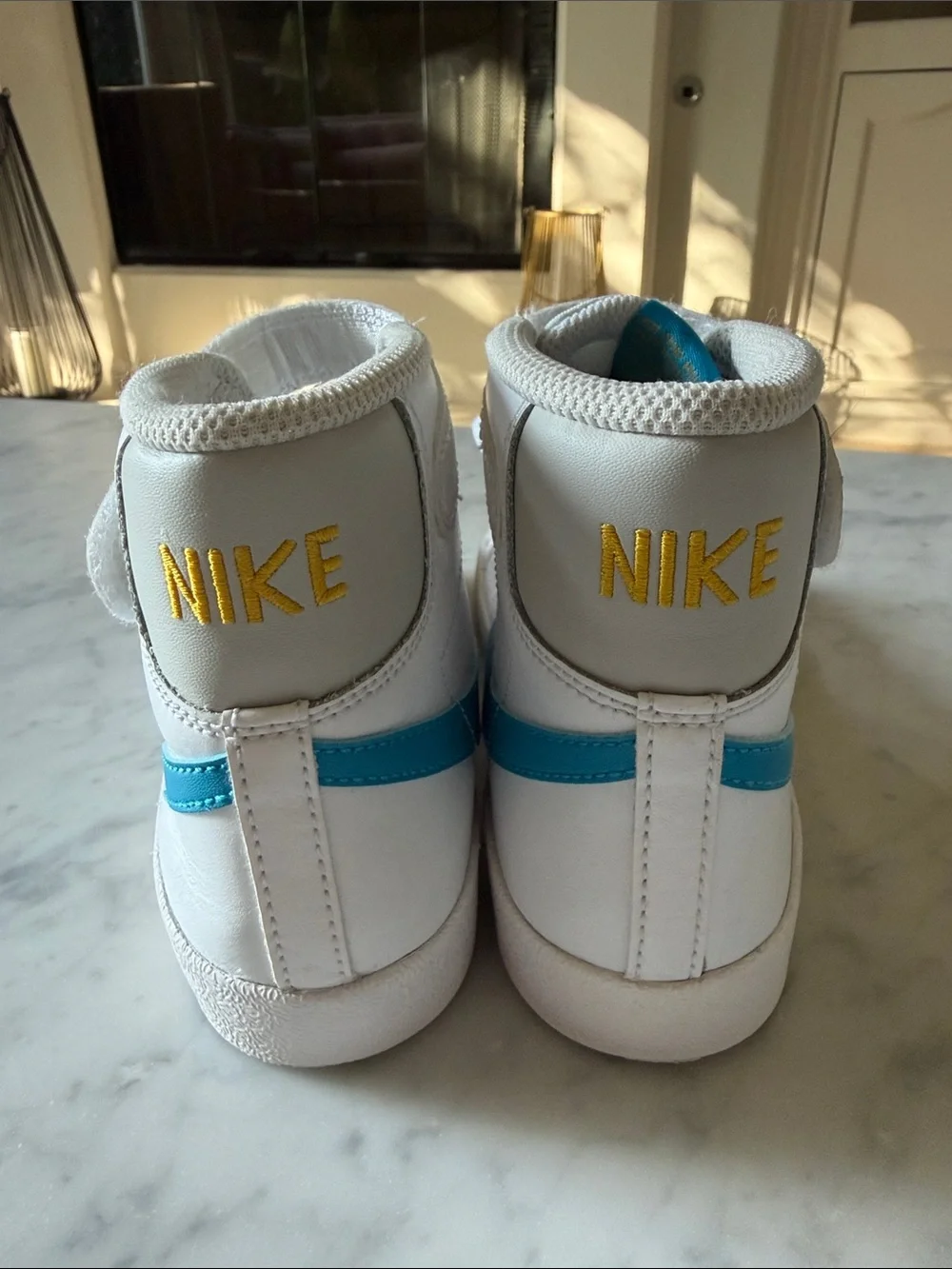 Nike Kids White High-Top Sneakers with Blue Swoosh size 3